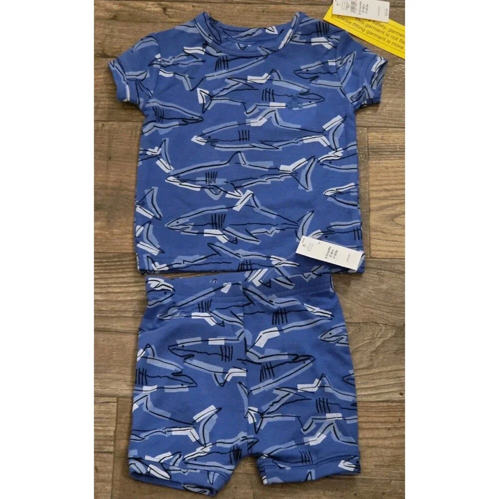 Baby Gap Shark PJ Short Set in blue with an allover shark print - 6 to 12 Mths